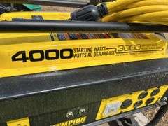 Champion 3000 generator c/w extension cord & garden hose - owner says runs