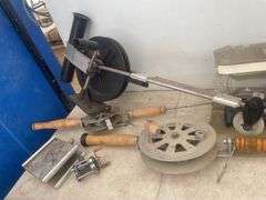 Quantity of deep water fishing rods, 12V filleting knife, and an Eagle fish finder - condition unkno