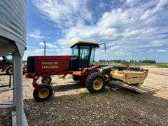 OFFSITE MELFORT: New Holland HW320 Haybine