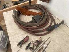 Tig torch parts and a leather welding jacket