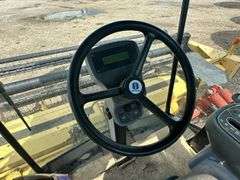 OFFSITE MELFORT: New Holland HW320 Haybine