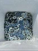 Qty of 3/8” flat washers, qty of 5/16” sealing washers, qty of 3/8” sealing washers
