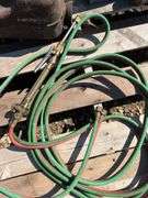 Pallet of misc, cutting torch, electric impact, mufflers etc