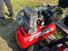Coleman Powermate air compressor c/w hose - owner says works