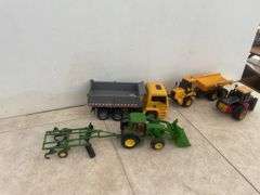 Assorted tractor and truck toys