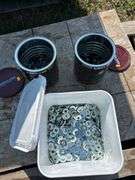 Qty of 3/8” flat washers, qty of 5/16” sealing washers, qty of 3/8” sealing washers