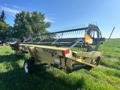 OFFSITE MELFORT: New Holland HW320 Haybine