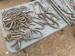 Quantity of meat hanging hooks and chains