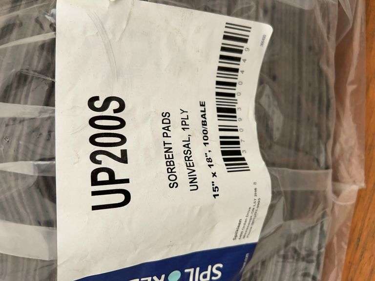 Bale of 15”x18” Universal absorbent pads, 2 bundles of 12”x12” towels