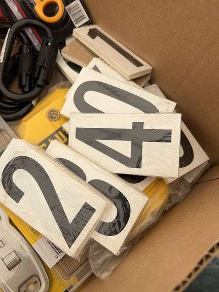 Qty of utility knives, qty of metal razor scrapers, pack of razor blades, qty of numbers, folding