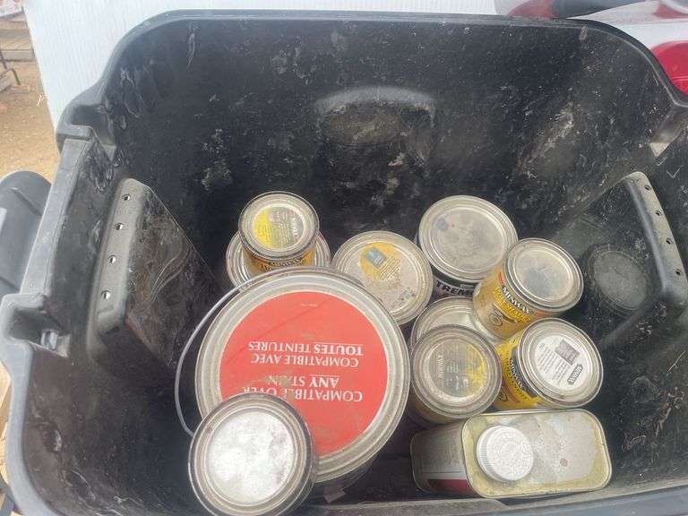 2 totes with quantity of misc partial cans of paints and stains, and one tote with misc