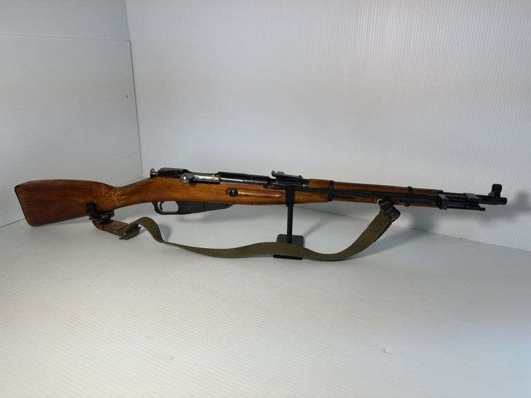 GUN: Believed to be 1946 6.5×52mm Carcano Model 38 rifle.
