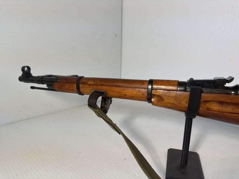 GUN: Believed to be 1946 6.5×52mm Carcano Model 38 rifle.