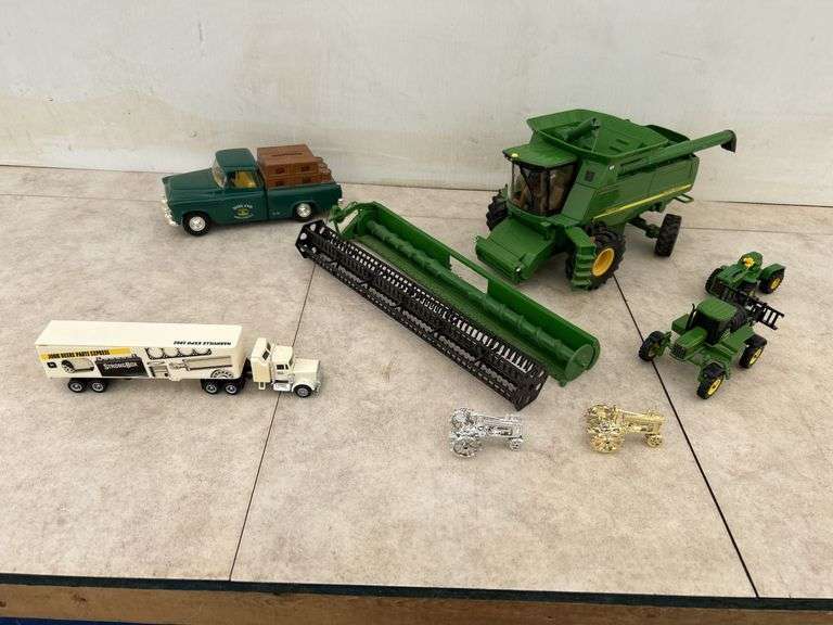 John Deere related toys, Chev coin bank truck, John Deere combine (header needs some glue), semi etc