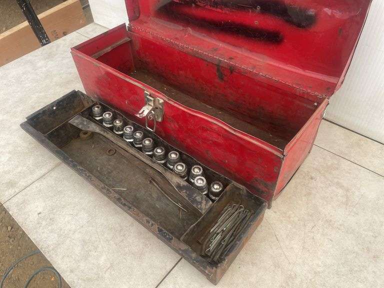 Metal toolbox with a quantity of John Deere male hydraulic coupler ends