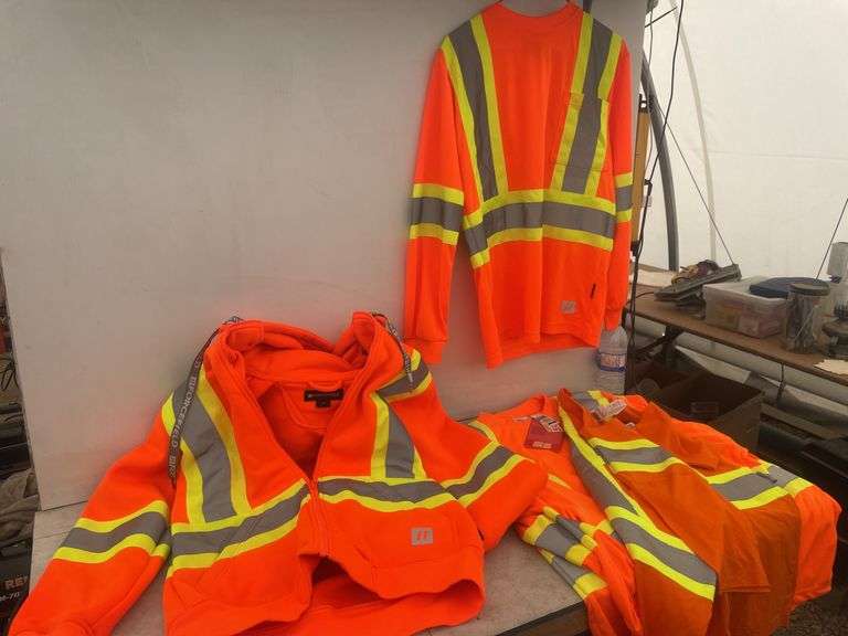 Quantity of size small safety shirts and a hoodie