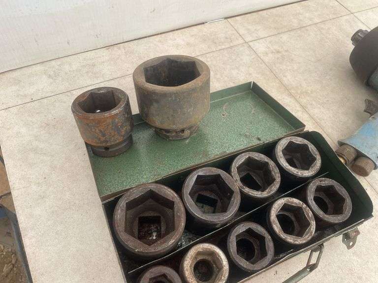 1" CP air impact and a quantity of impact sockets