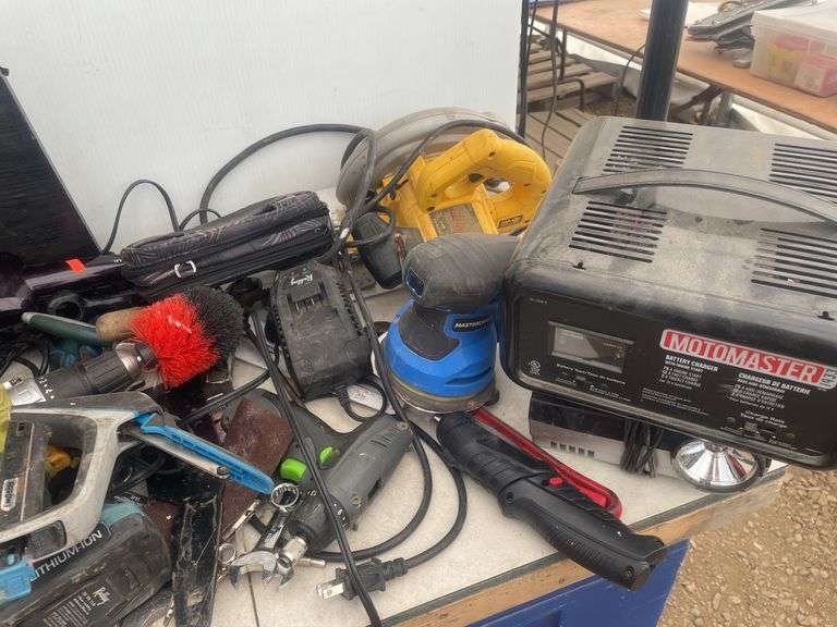 Quantity of misc tools and hardware, including DeWalt saw.