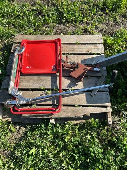 Scooter, folding chair, clay pigeon catapult