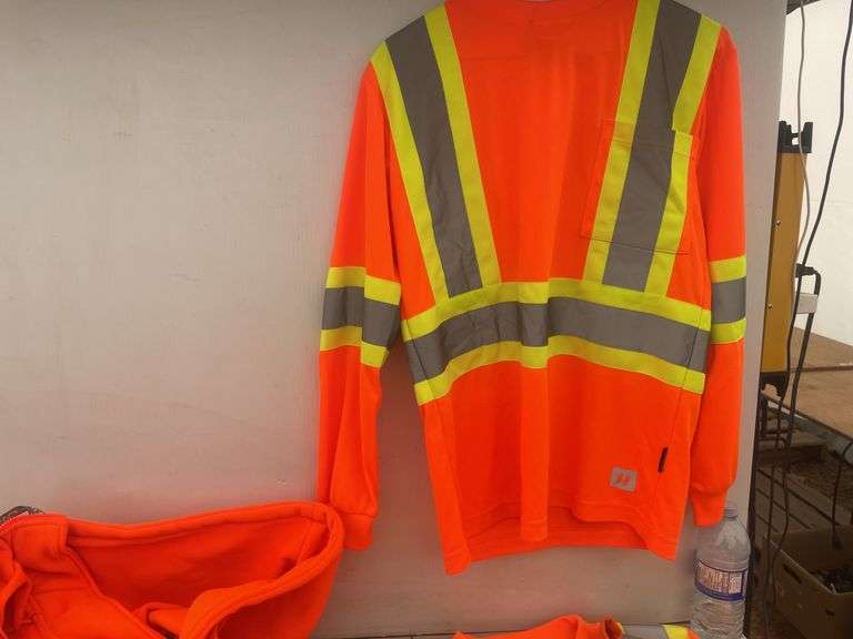 Quantity of size small safety shirts and a hoodie