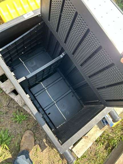 Pair of plastic storage boxes, snow shovel, folding sawhorses