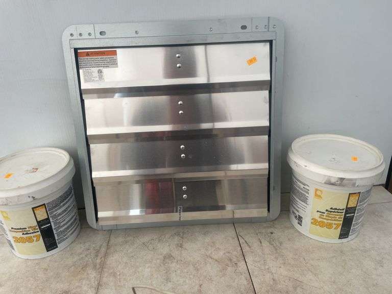 2 containers of tile adhesive and a fan louver 16"x16"