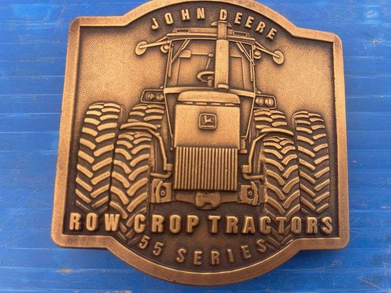 Pair of John Deere 55 series belt buckels