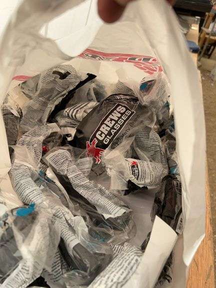 Large bag of assorted safety glasses