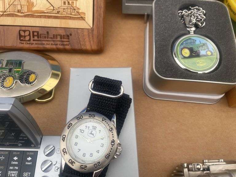 Box of collectible items including watches etc.