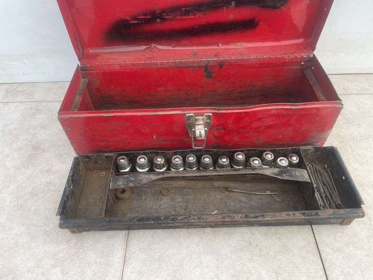 Metal toolbox with a quantity of John Deere male hydraulic coupler ends