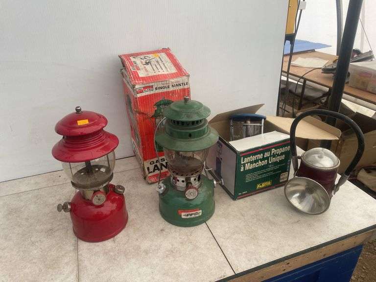 Pair of Colemen gas lanterns, 1 propane lantern and one battery operated lantern