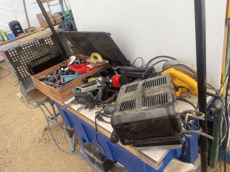 Quantity of misc tools and hardware, including DeWalt saw.