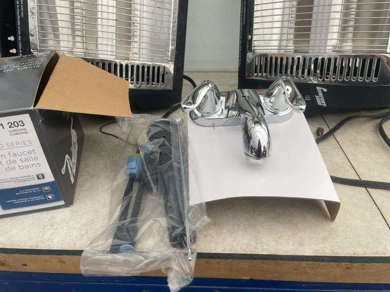 Used infrared heaters, a set of unused bathroom faucets