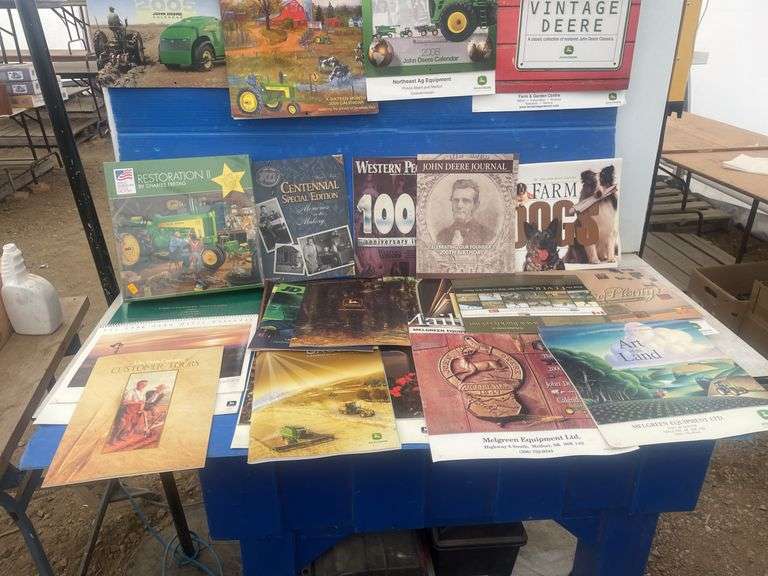 Quantity of John Deere and misc. calendars, misc journals and 1000 piece jigsaw puzzle