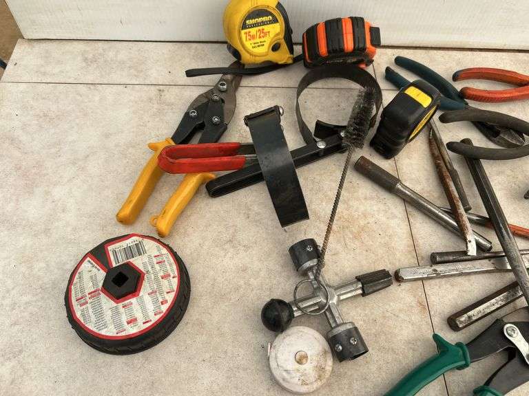 Qty of tape measures, pliers, side cutters, filter wrenches etc.