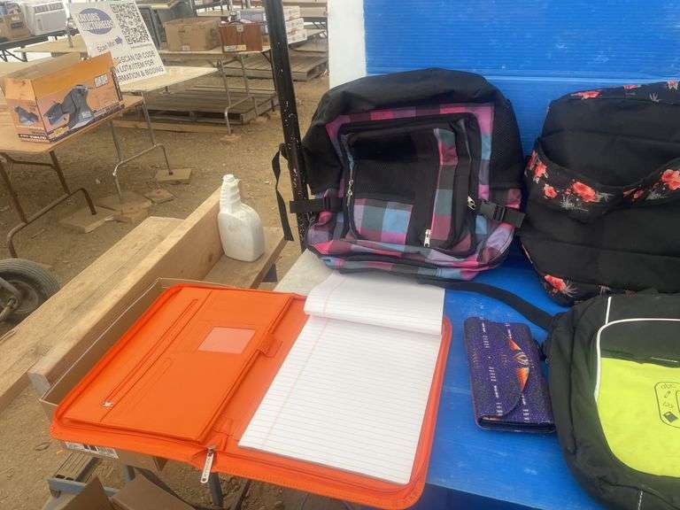 Quantity of hand bags comes with garbage can