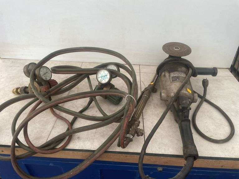 Black and Decker angle grinder, oxy/acetylene cutting torch comes with dual gauges