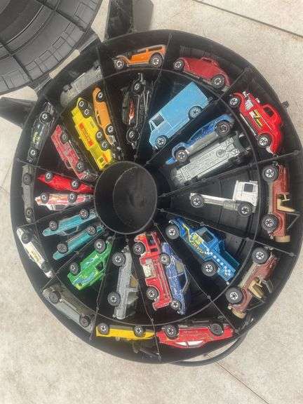 Quantity of diecast toys mostly hot wheels in case.