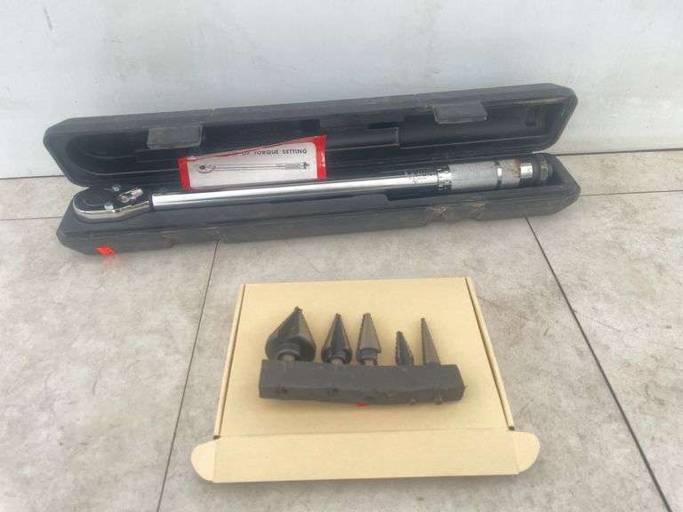 1/2" dr. torque wrench and a set step bits