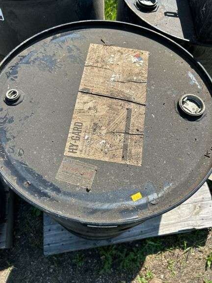 2 steel barrels, 1 plastic barrel & John Deere toolbox