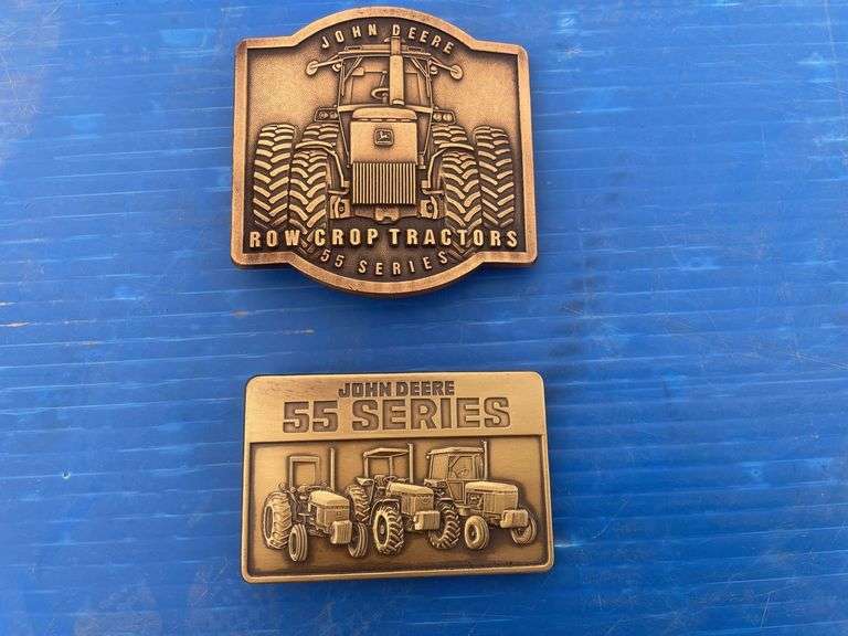Pair of John Deere 55 series belt buckels