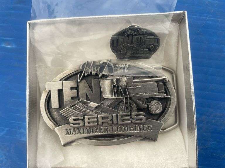 John Deere 10 series maximizer combine, belt buckle and tie pin.