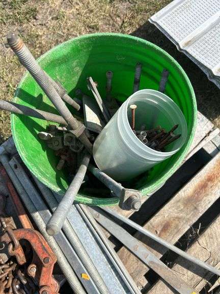 Pallet with logging chain, load binders , ice tongs etc