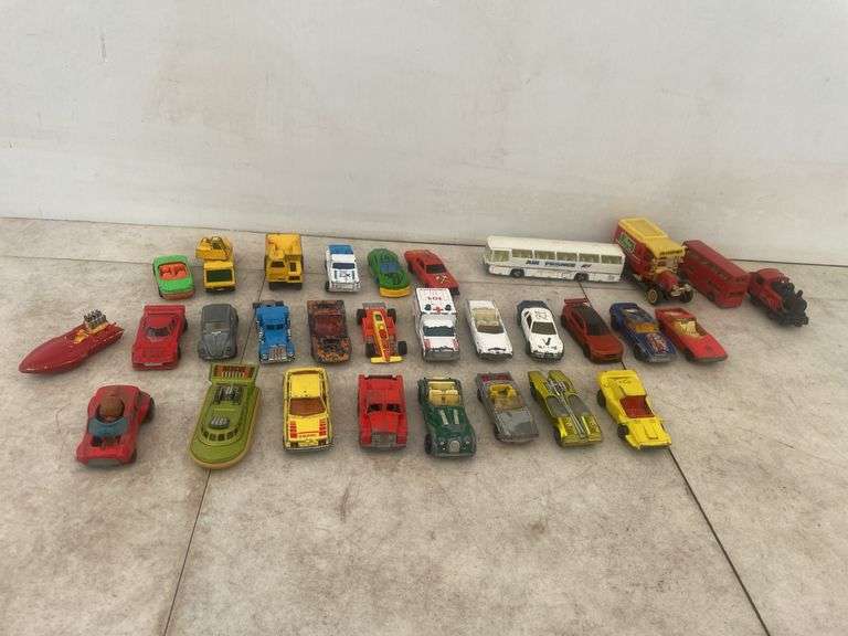 A number of 1:64 scale diecast models various makes