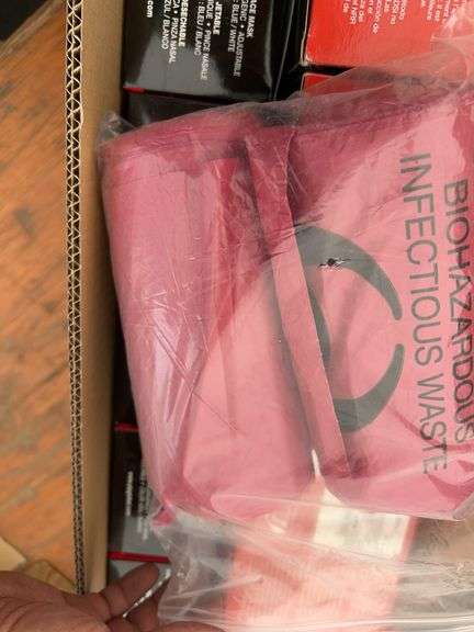 Hard hat mounted ear muffs, disposable masks, bio hazard waste bags