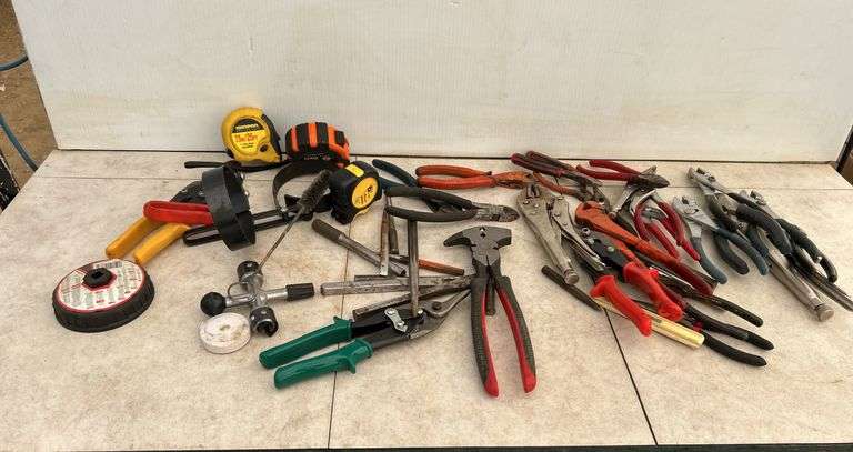 Qty of tape measures, pliers, side cutters, filter wrenches etc.