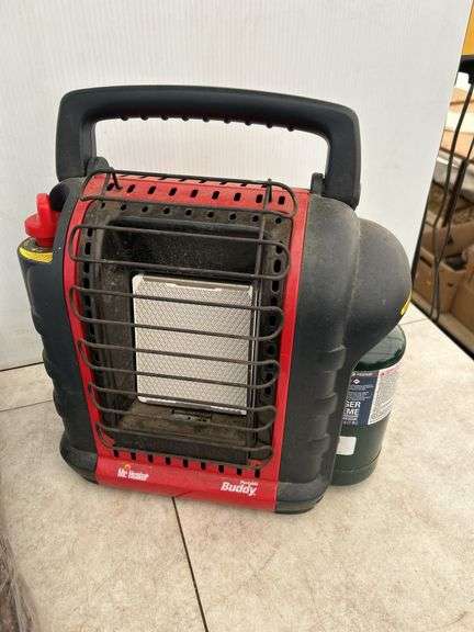 Mr. Heater portable propane camping heater and a tarp 18'x24'