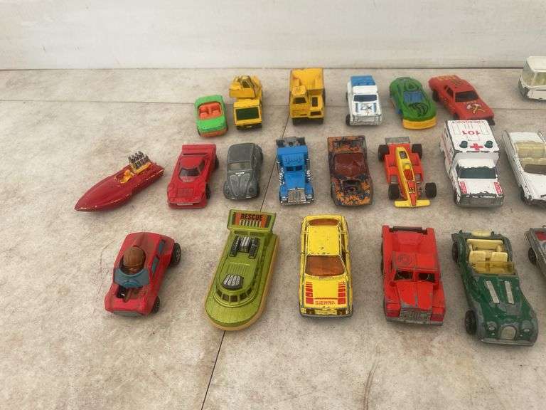 A number of 1:64 scale diecast models various makes