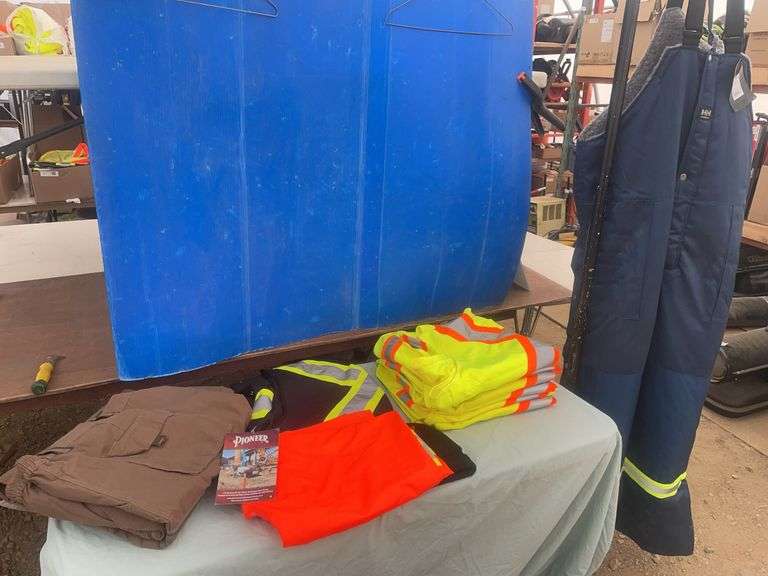 Helly Hansen 2XL insulated bib overalls, quantity of 4XL safety vests, 5XL PU stretch Hi-Viz Flame