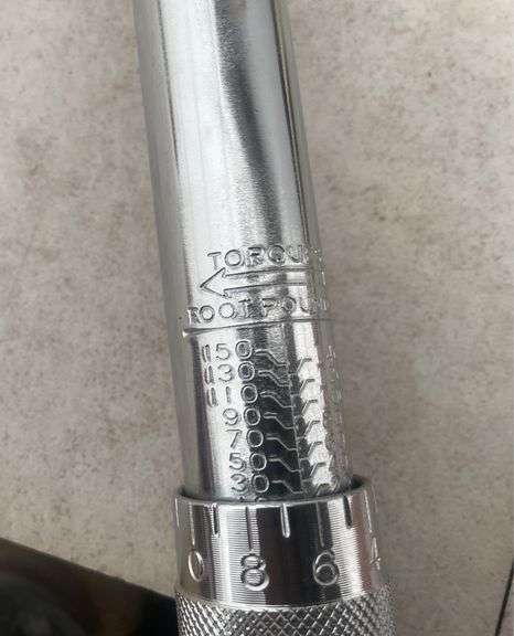 1/2" dr. torque wrench and a set step bits